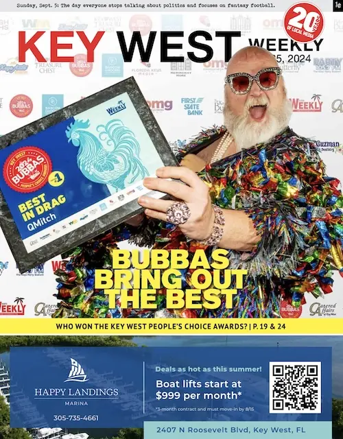 a magazine cover with a man holding a tablet
